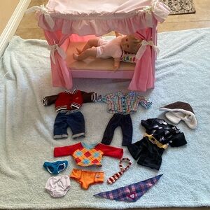 American girl, doll and clothes
Not the bed